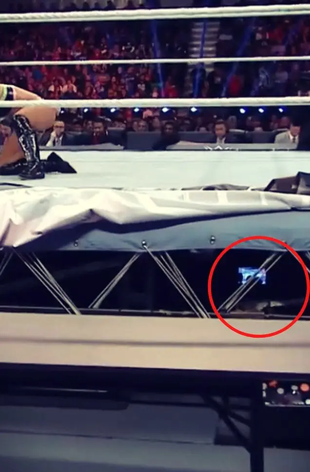 monitors hidden under WWE ring